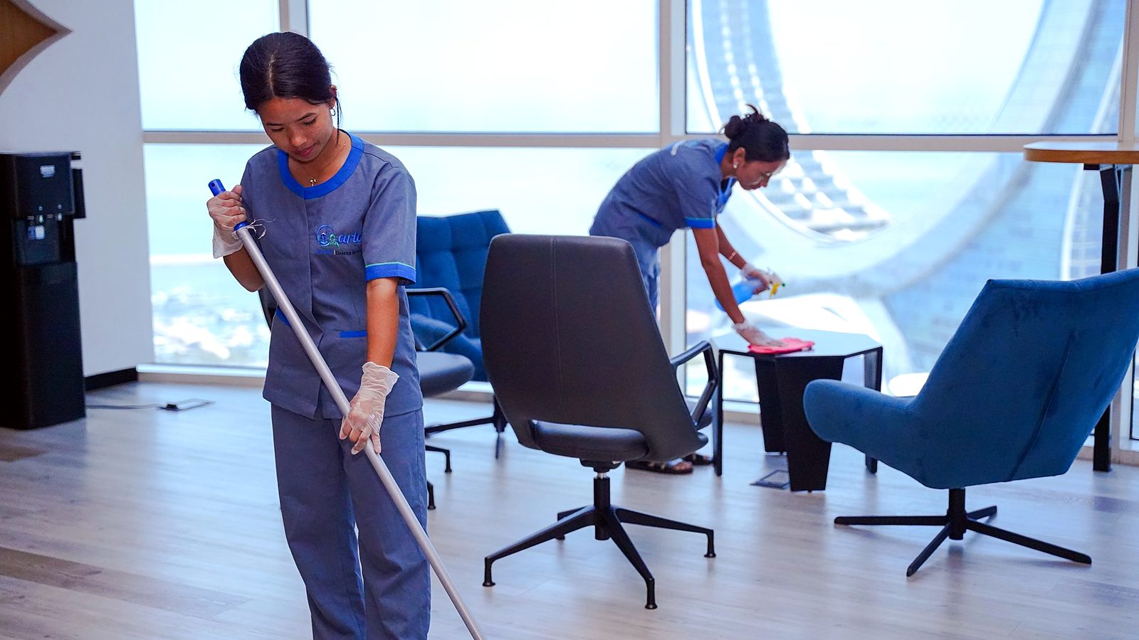 Maid in Qatar – Carla Maid hourly maid mopping the floor in Lusail